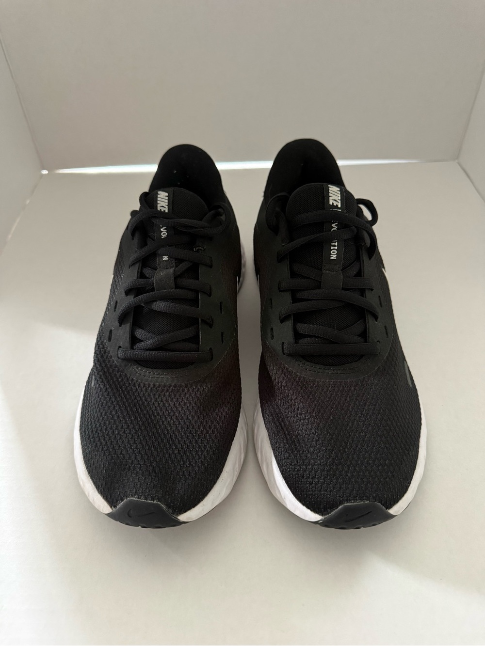 Nike Revolution Women’s Black and White Lightweight Running Shoes